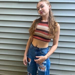 Knitted top. Ties around neck and back. Great for fall. Only wore once.